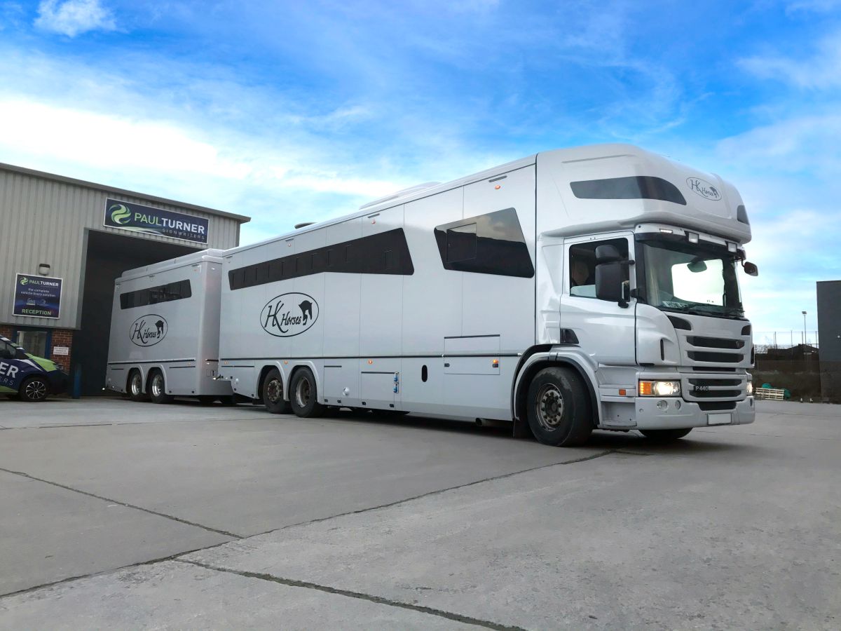 Side view of large horsebox and trailer with gloss grey vinyl wrap.